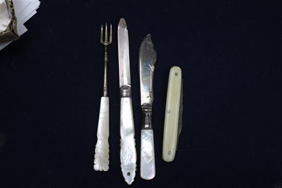 Seven 19th century and later silver and mother of pearl handled travelling forks a similar silver fruit knife and three other items.